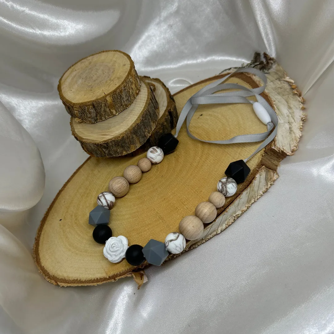 Collier d'allaitement rose marbré