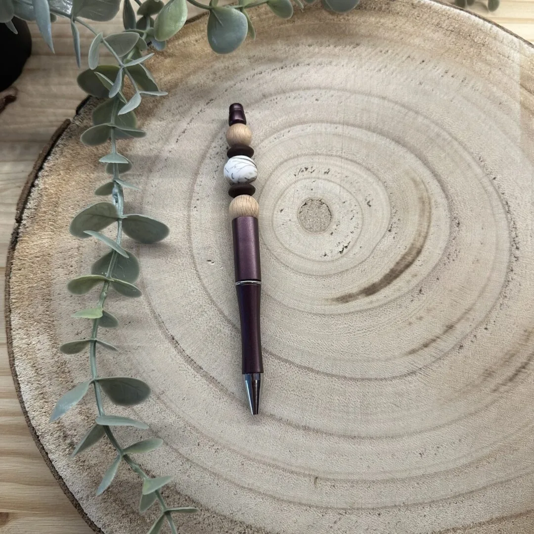 Stylo aubergine parle d'automne