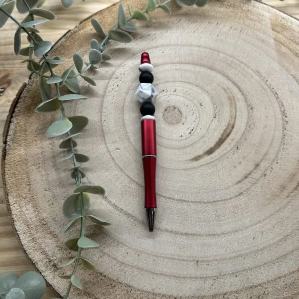 Stylo rouge blanc marbré