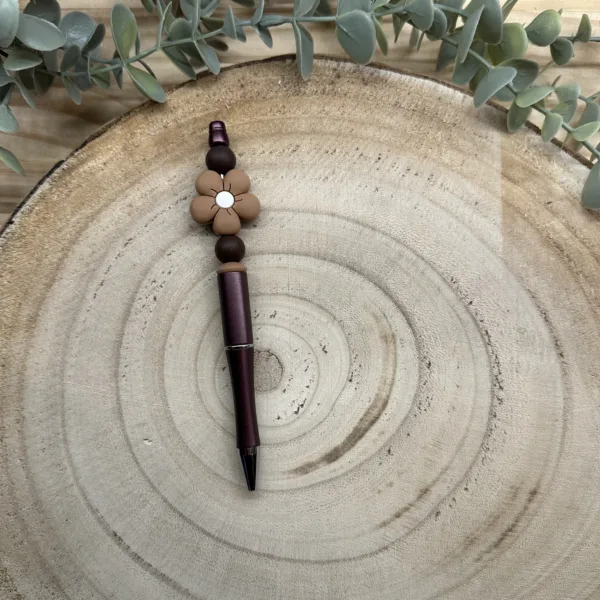 Stylo aubergine fleur marron